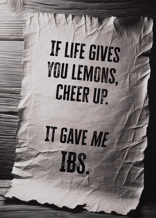 Funny greeting card with humorous text about lemons and IBS on crumpled paper background.